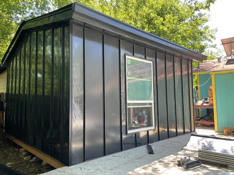 Black standing seam metal wall panels for Roof Inspection in Kalispell