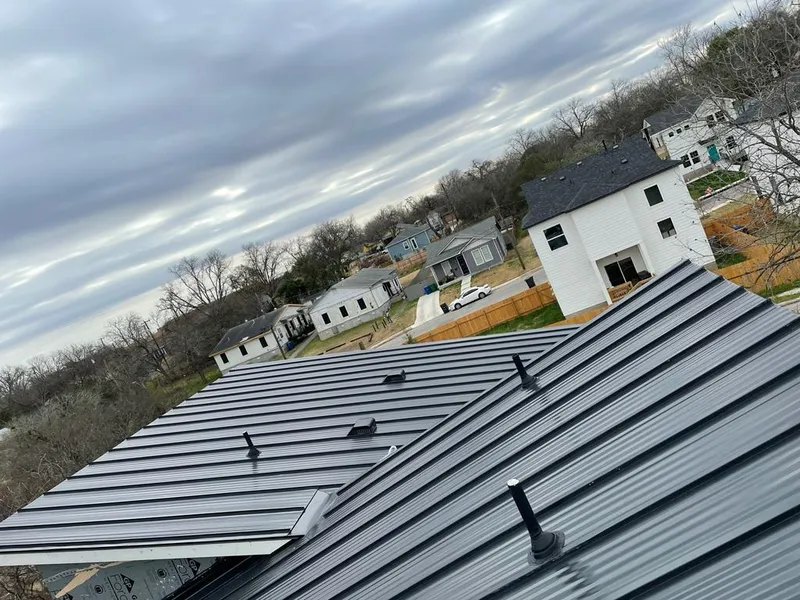 Standing seam metal roof panels with vents for Skylight Repair in Kalispell